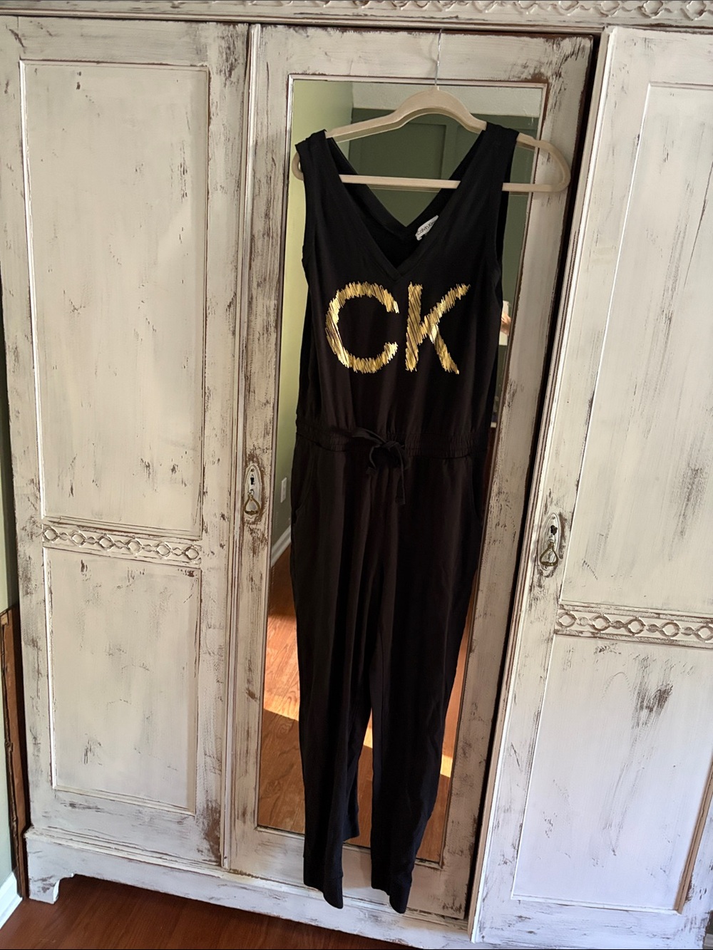 Calvin Klein Black Sleeveless Jumpsuit with Gold CK Graphic M